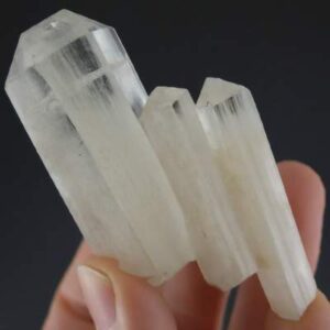 A clear, geometric Phenakite crystal specimen